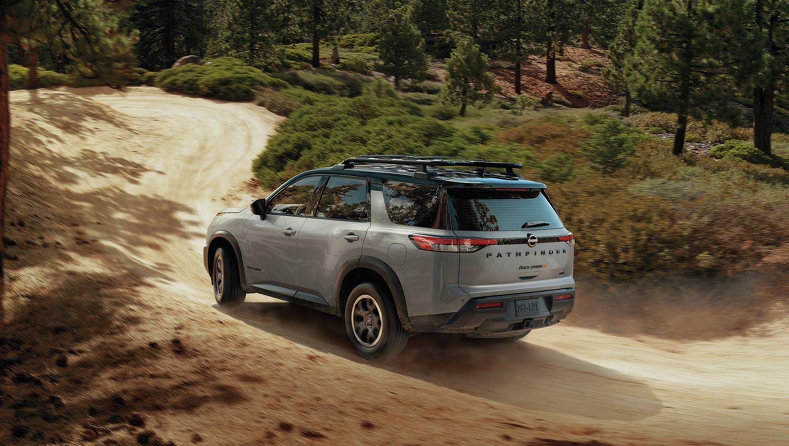 2023 Nissan Pathfinder cruising on the mountain road. 2023 Nissan Pathfinder cruising on the mountain road.