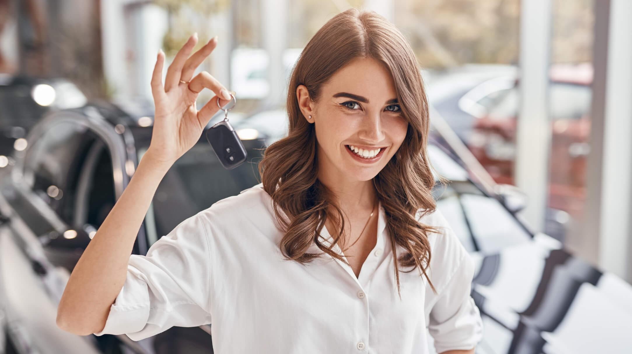 Happy Customer holding key Happy Customer holding key
