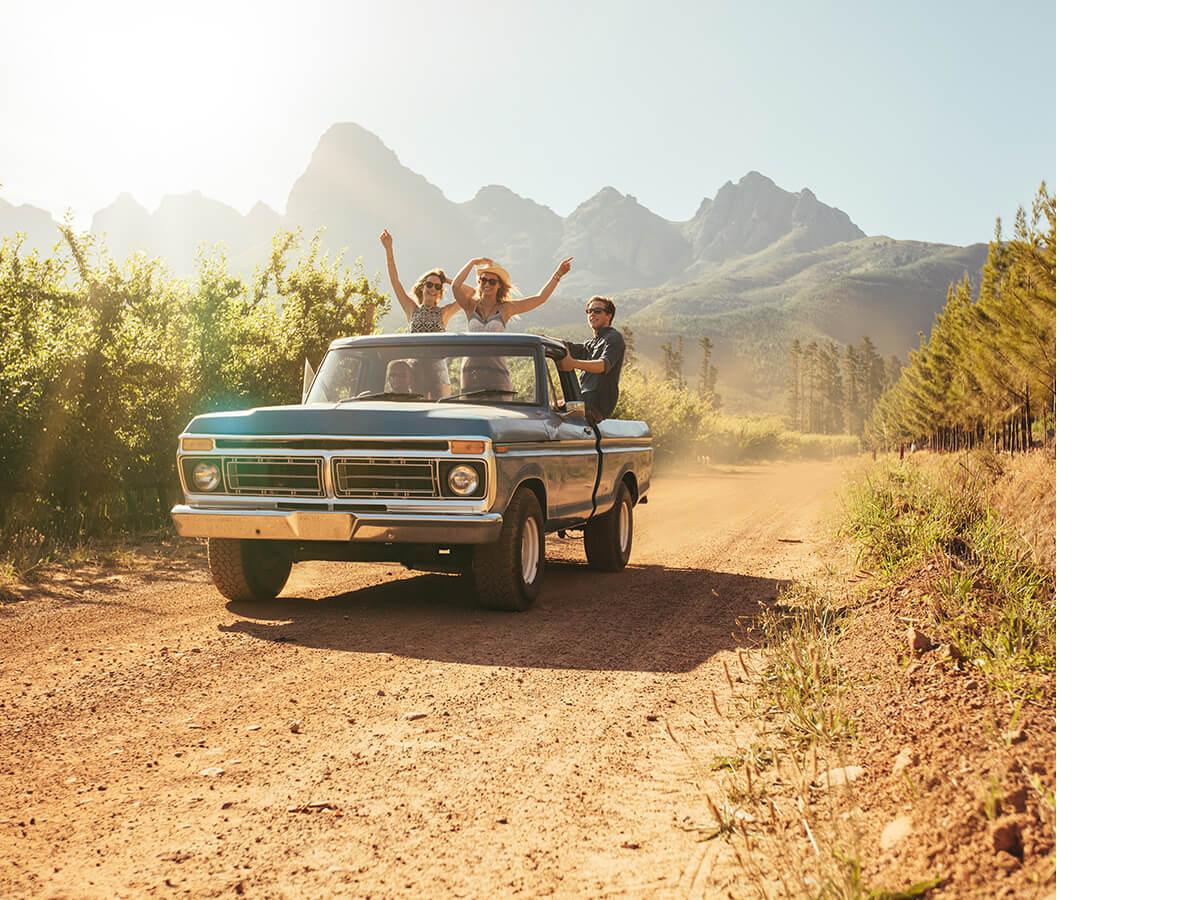 Young friends in a pickup truck
