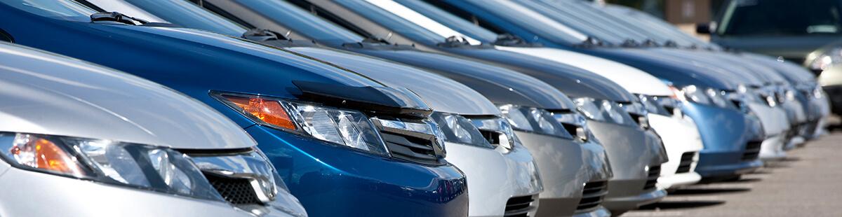 Vehicles parked on a dealership lot