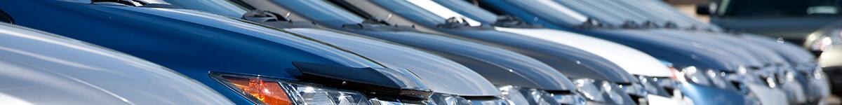 Vehicles parked on a dealership lot