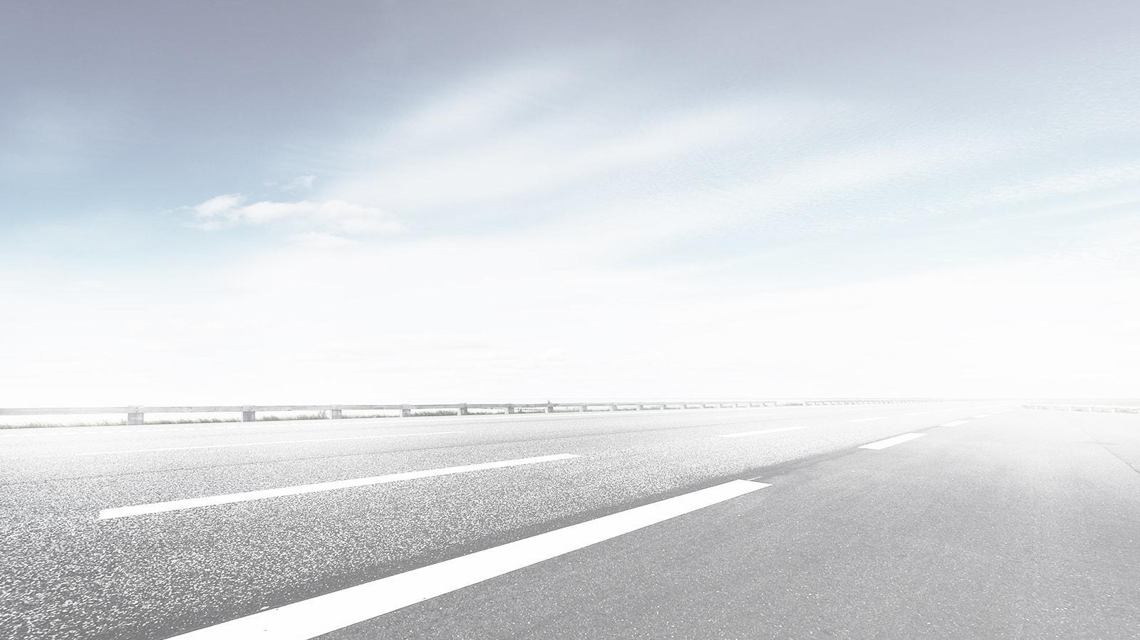 Freeway under a blue sky