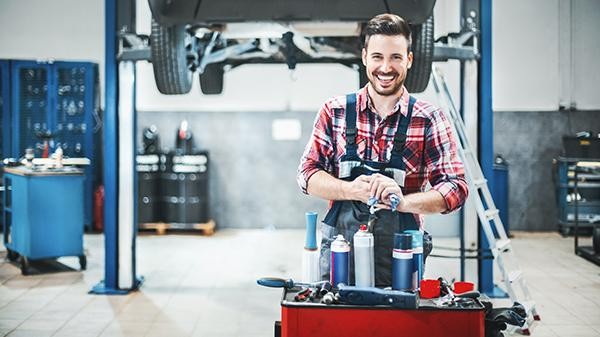 Smiling service mechanic