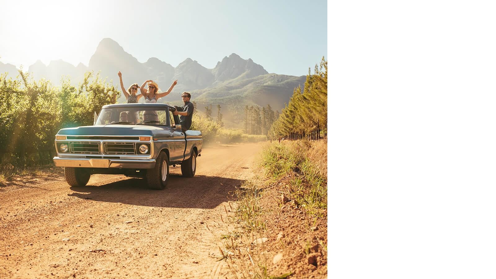 Young friends in a pickup truck