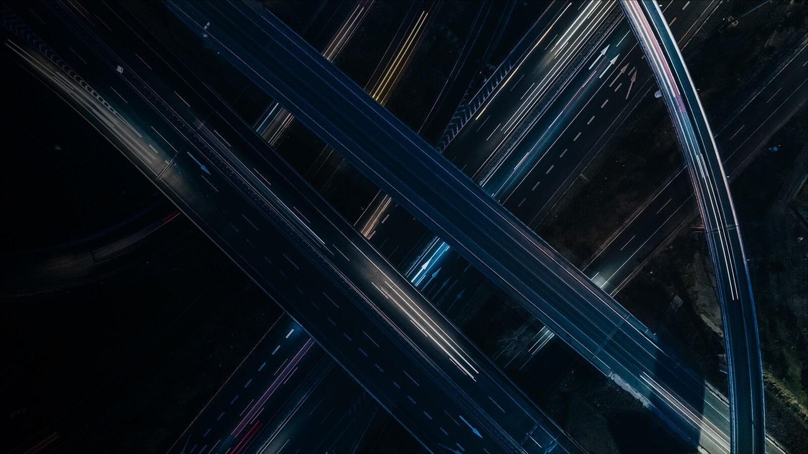 Aerial view of a highway overpass at night