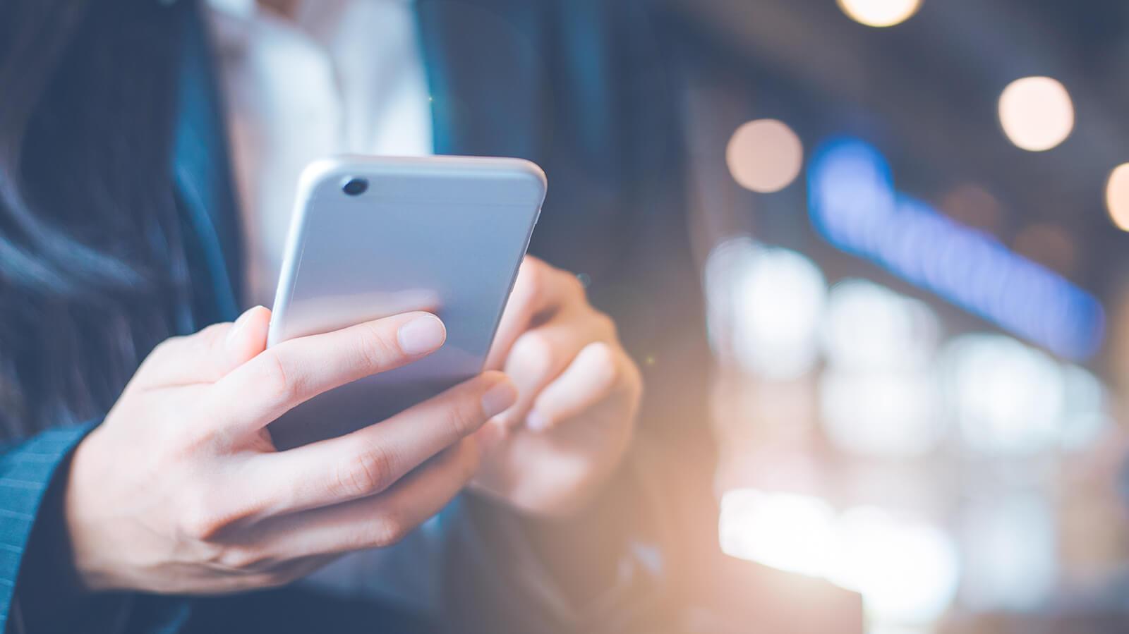 Woman holding a cell phone