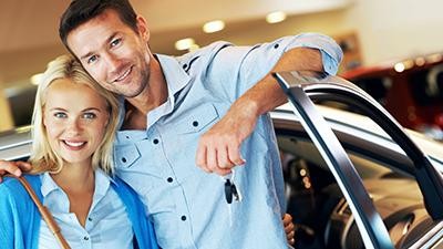 Couple holding car keys