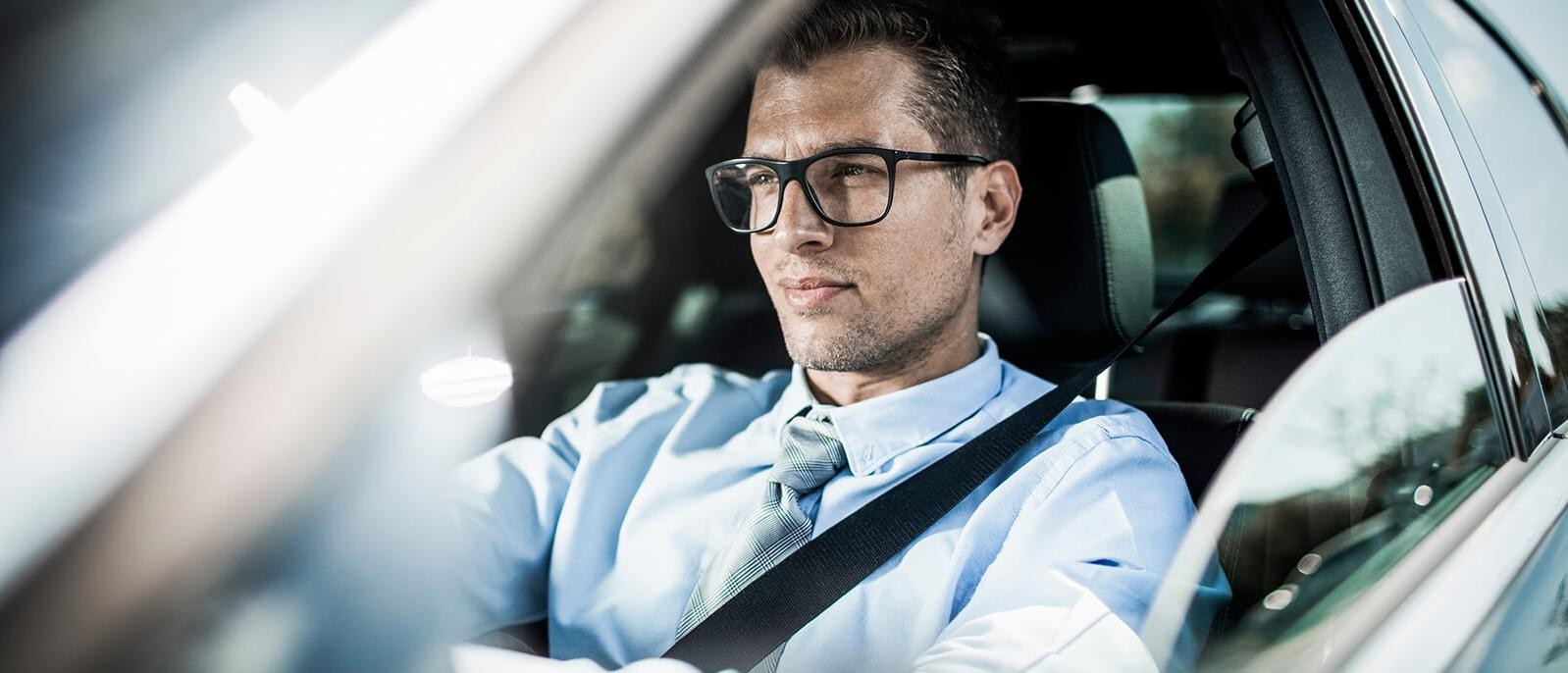 Man driving a car