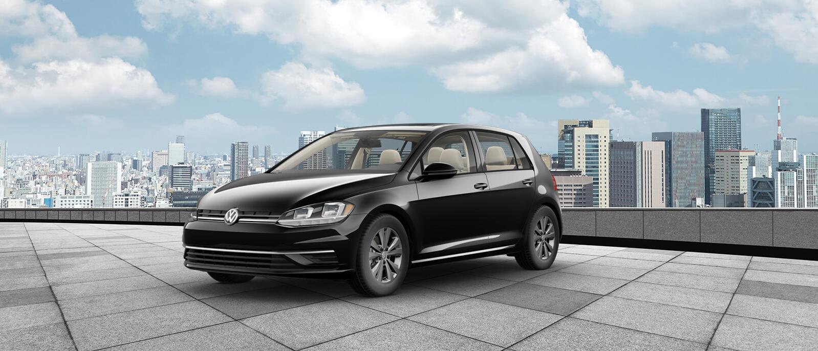 A Black Golf parked outside the city A Black Golf parked outside the city