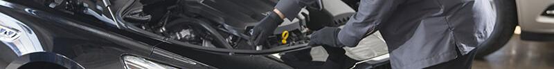 Certified-Service Mechanics in Service Bay Certified-Service Mechanics in Service Bay
