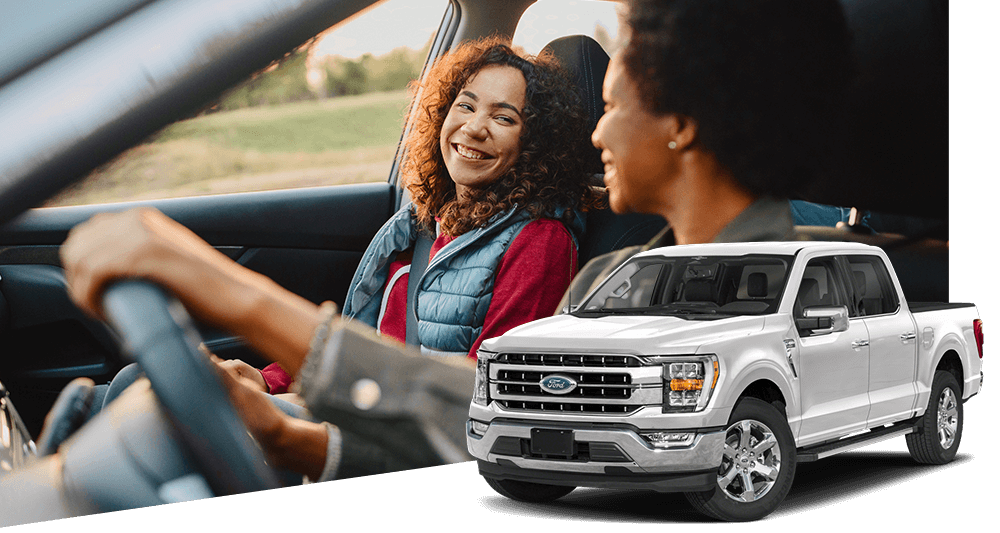 Two friends sitting in vehicle driving