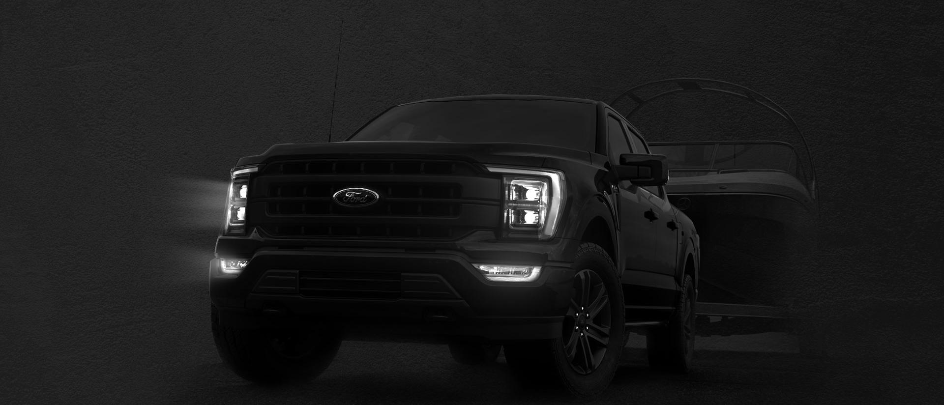 Dark Background f150 towing a boat Dark Background f150 towing a boat