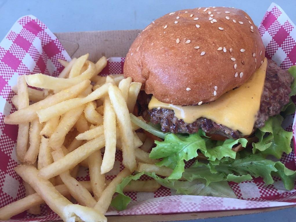 Burger and fries sitting in a food basket at a local restaurant in Savannah, Georgia