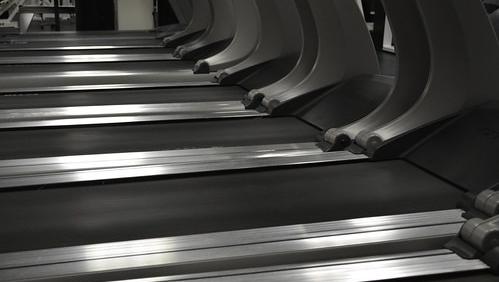 Line of treadmills at a gym
