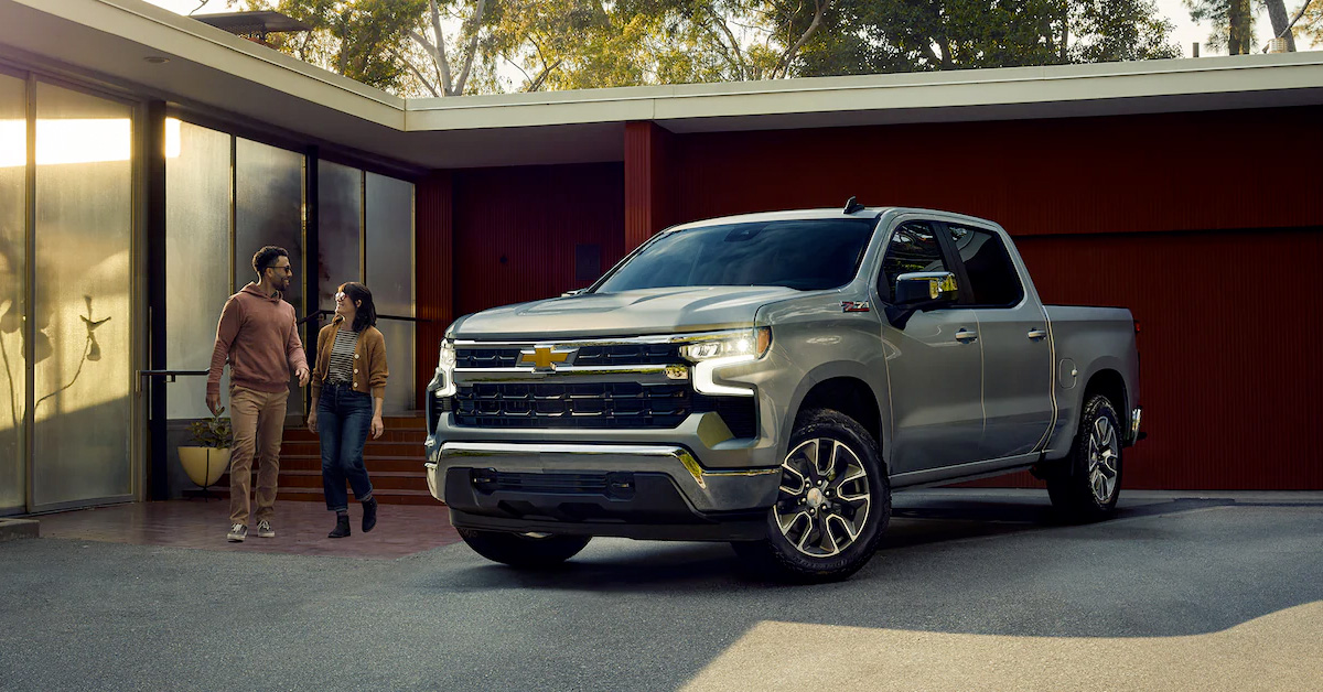 2023 Chevy Silverado Parked with Couple Walking towards it