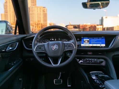 The steering wheel and dashboard of the 2025 Buick Envision.