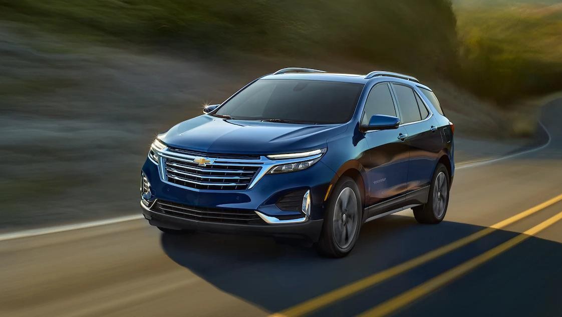 2022 Chevrolet Equinox Blue Glow Metallic 3/4 view on mountain path