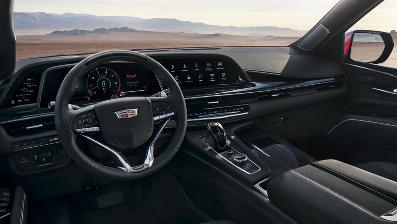 Interior with Man Driving Cadillac