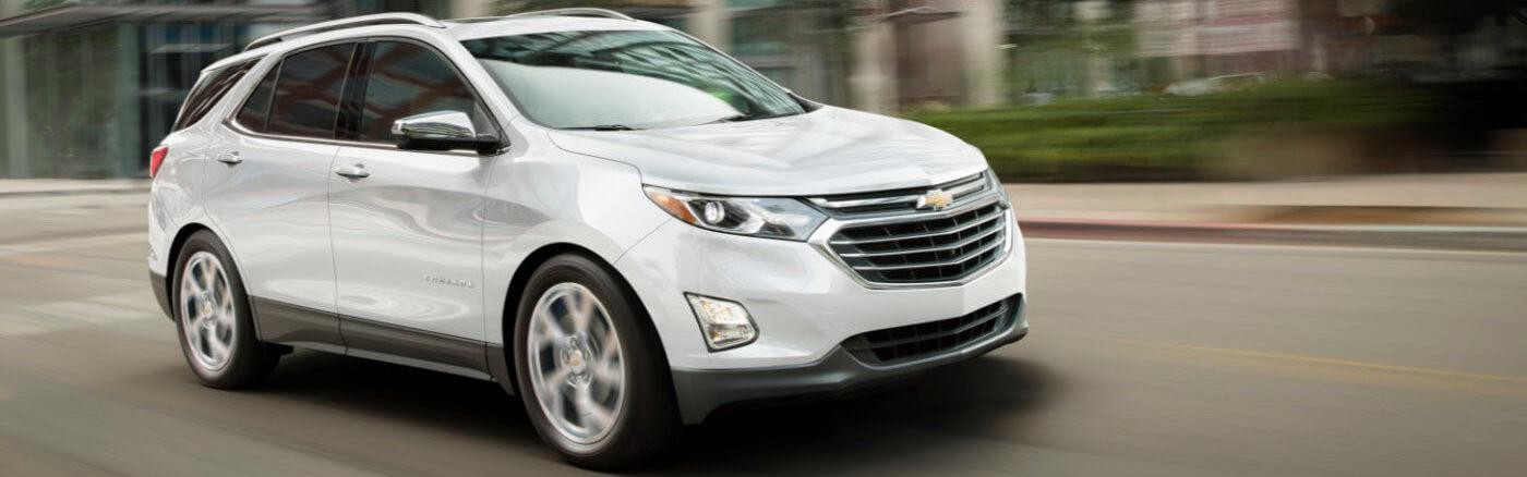 White Chevy Equinox Driving Through the City White Chevy Equinox Driving Through the City