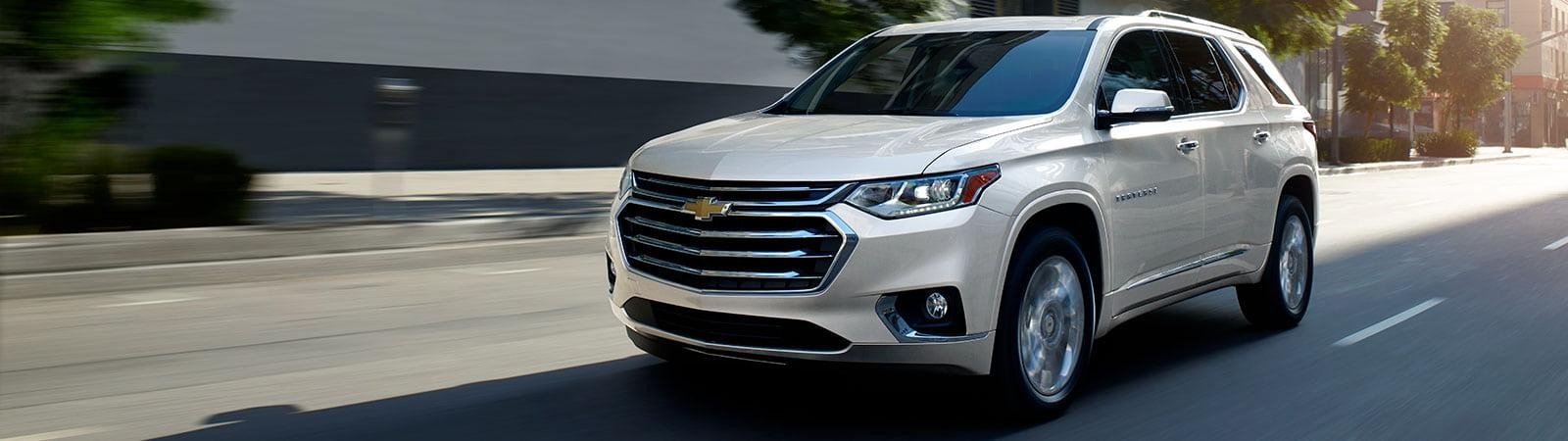 2019 Silver Chevy Traverse driving