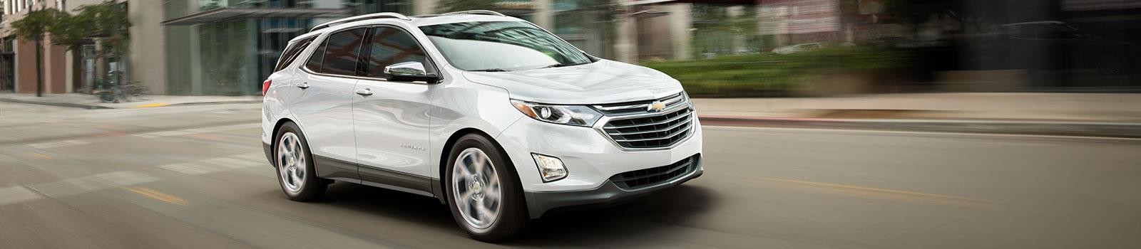 2019 Chevy Equinox white driving