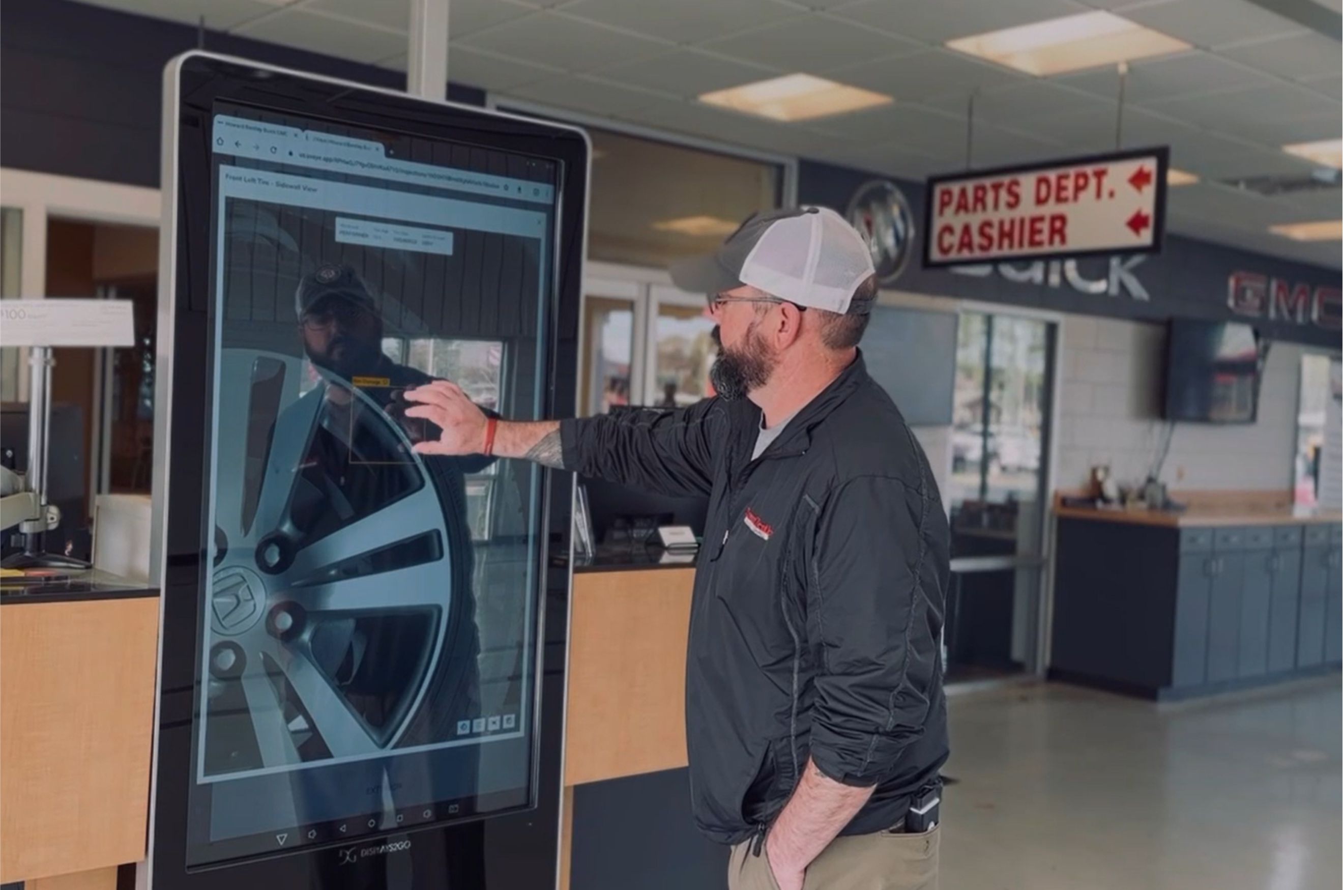 GMC Tech Fixing Brakes