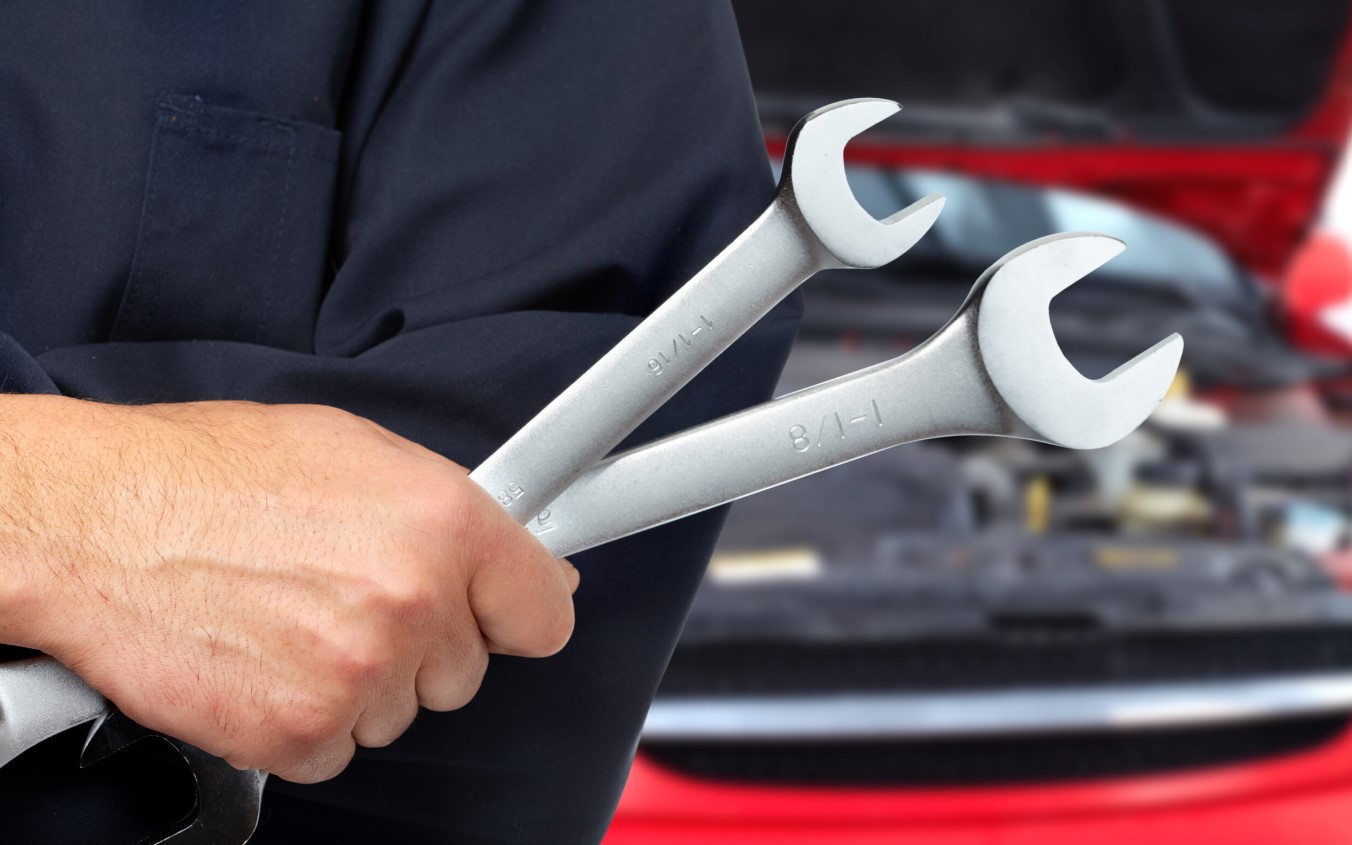 Mechanic holding a wrench