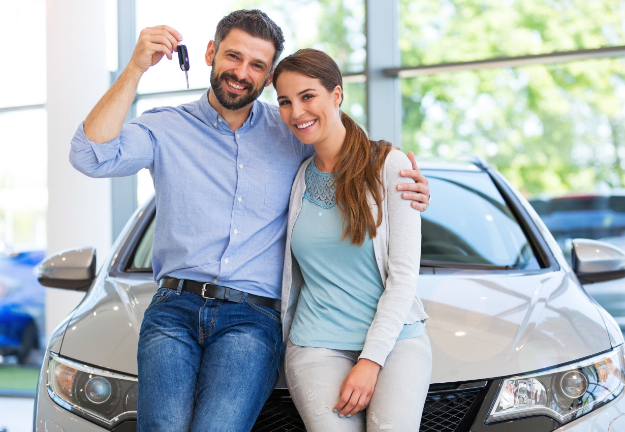 Certified Chevy Technician handing customer her keys