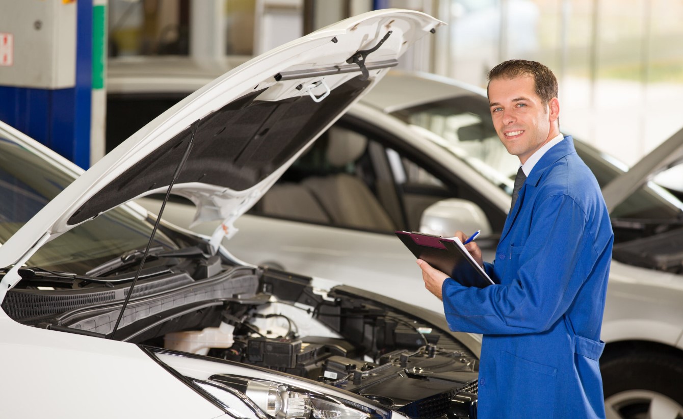 Mechanic working on car