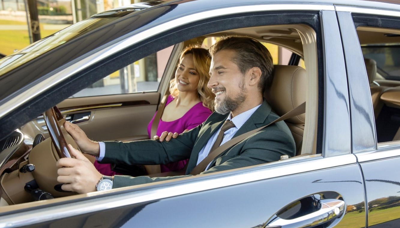 African American couple buying a car