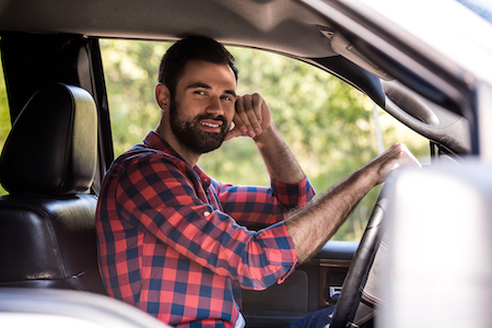 truck owner sitting in his truck