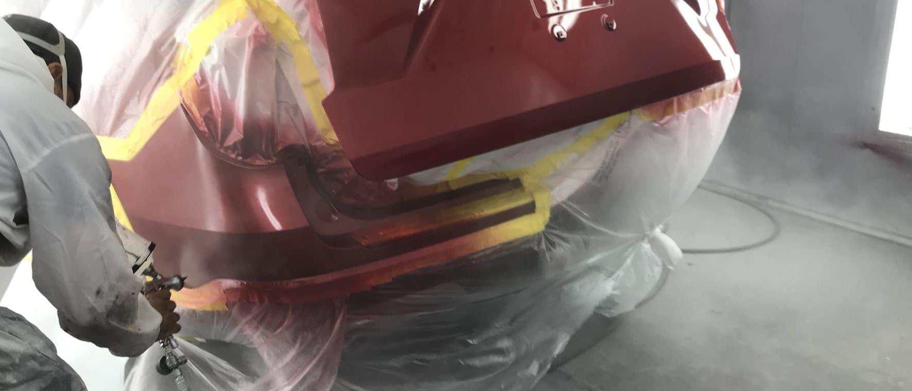 Vehicle getting painted in Kempton auto-body