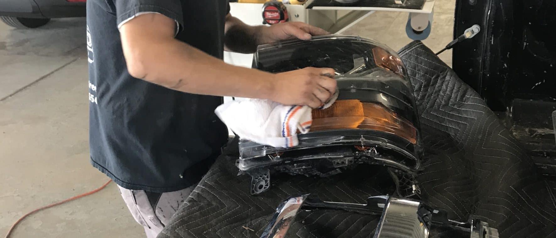 Technician working on parts