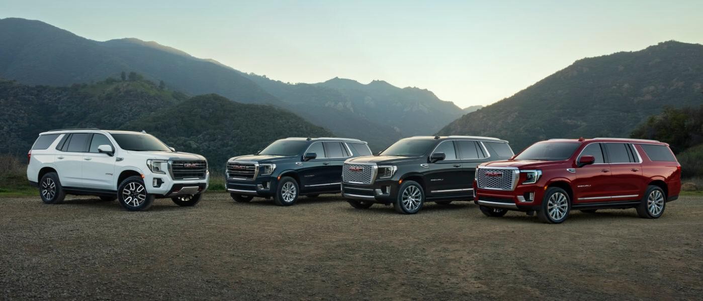 2024 GMC Yukon 4 shot in front of mountains