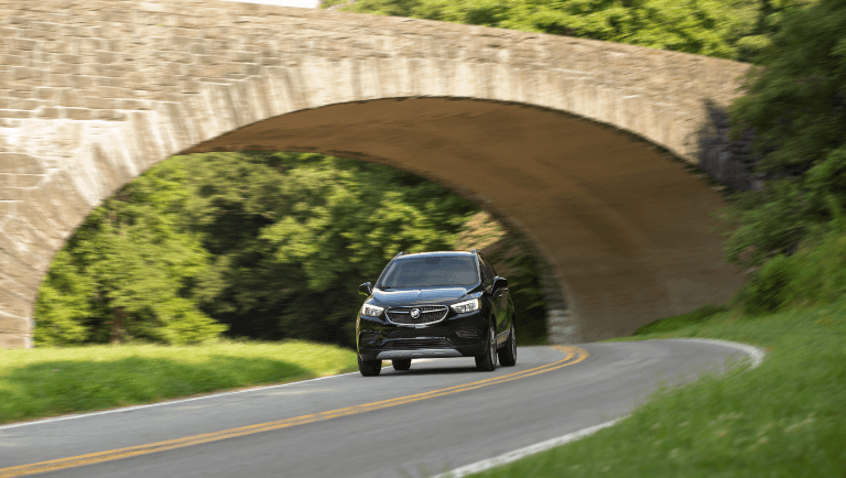 2021 Buick Encore driving under bridge