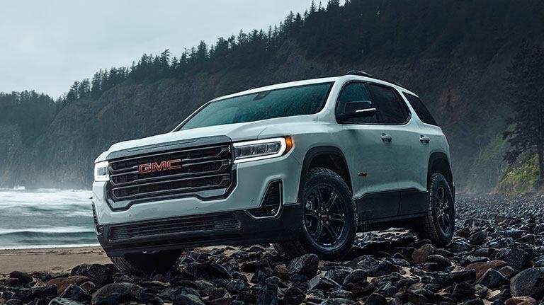 2021 GMC Acadia on a rocky beach