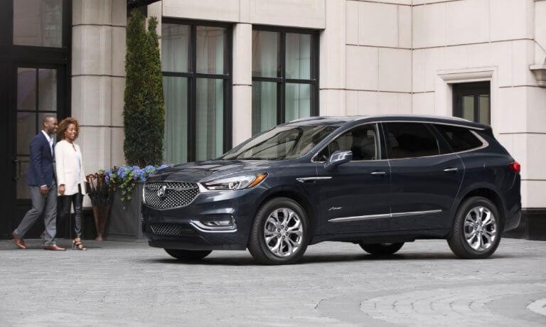 2021 Buick Enclave exterior couple walking