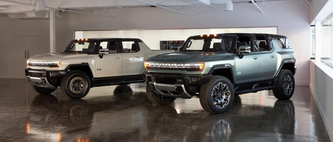 2022 Hummer EV Truck & SUV side by side in showroom