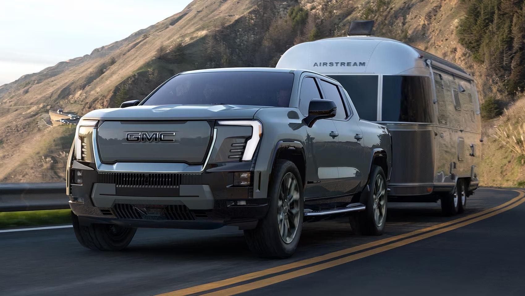 2025 Sierra EV towing a trailer