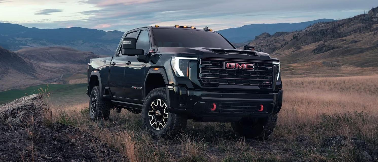 2025 GMC Sierra HD parked in a field