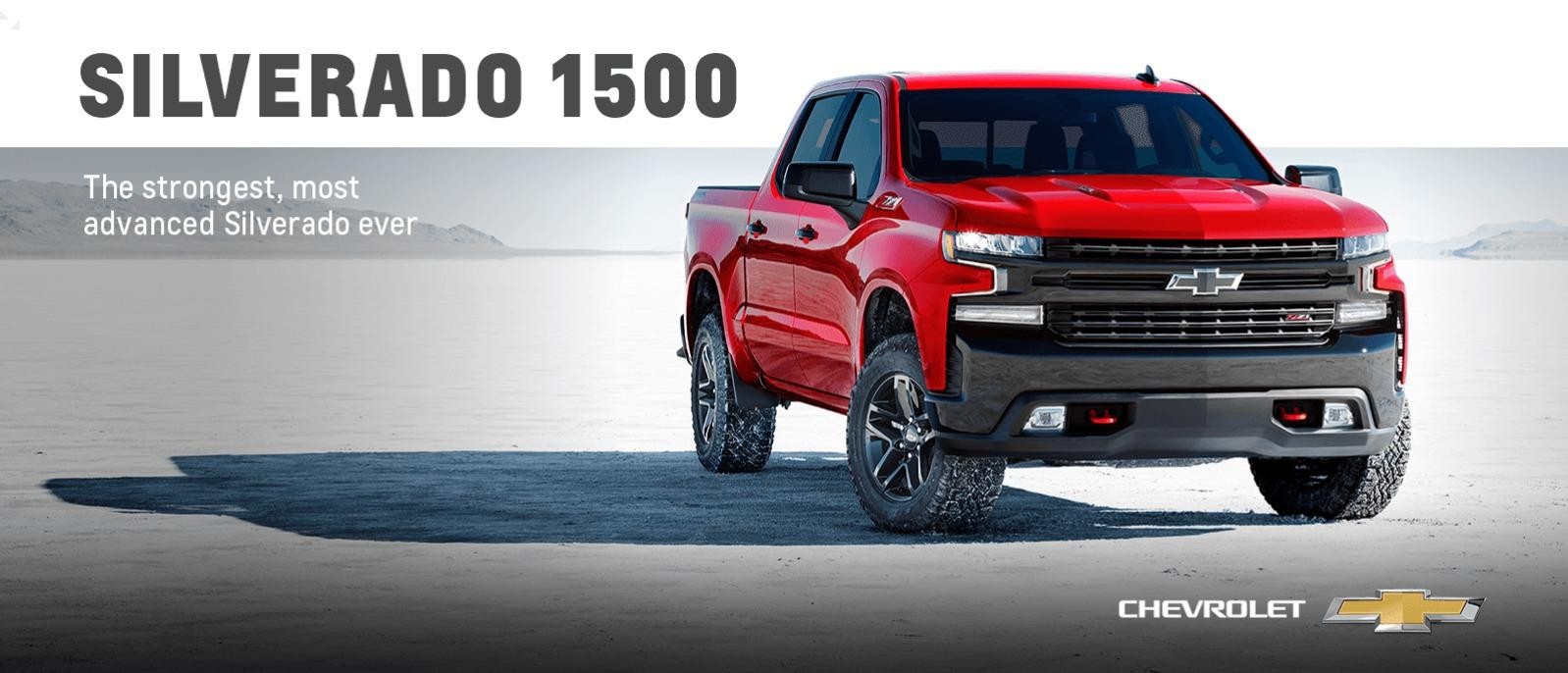 A red All-New Silverado 1500 parked in a desert salt flat.