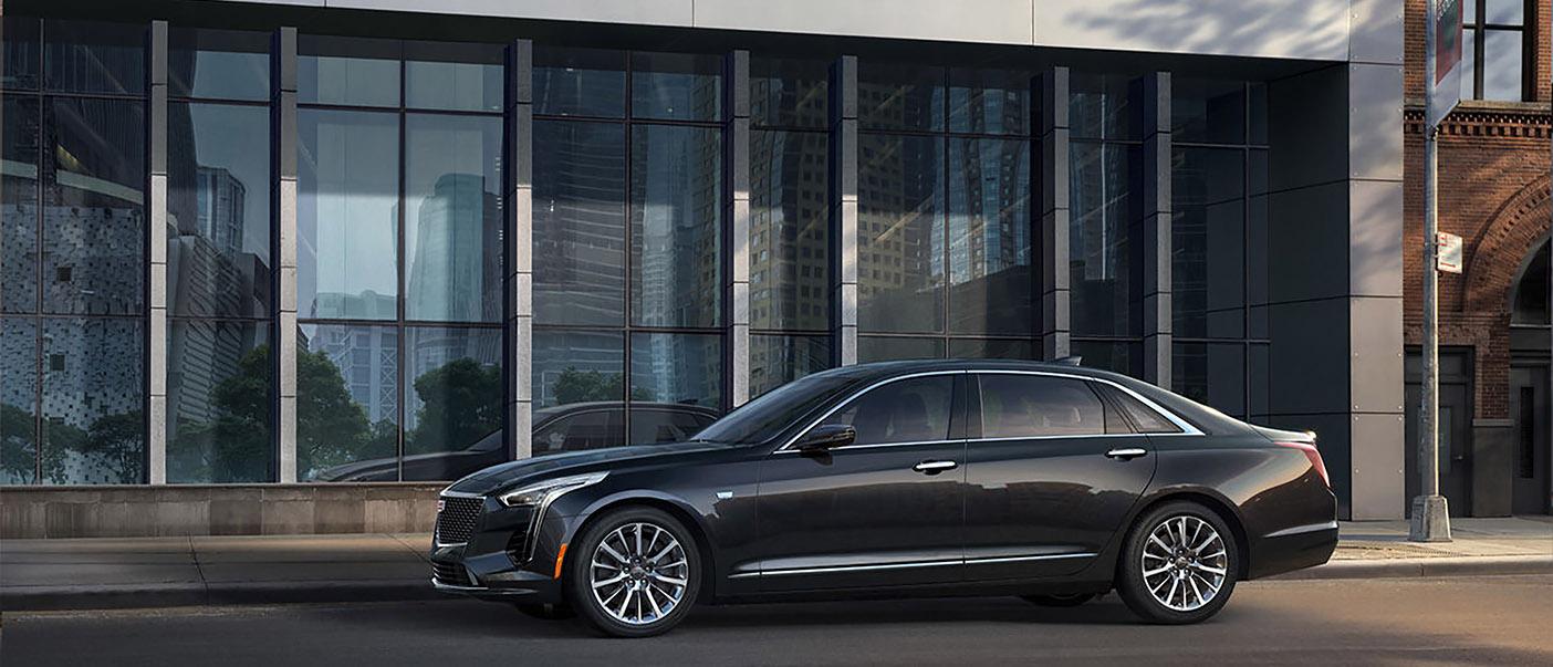 CT6 parked in front of building