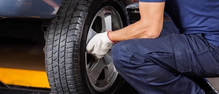 Taking off tire to be replaced or rotated