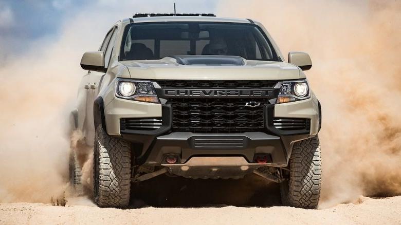 Chevrolet Silverado HD blasting through dirt