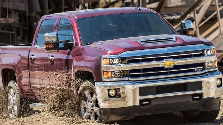 Chevrolet Silverado HD blasting through dirt