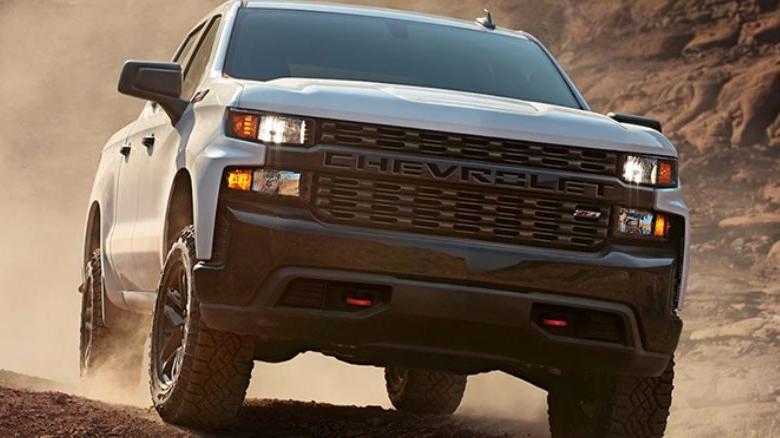 Chevrolet Silverado HD blasting through dirt