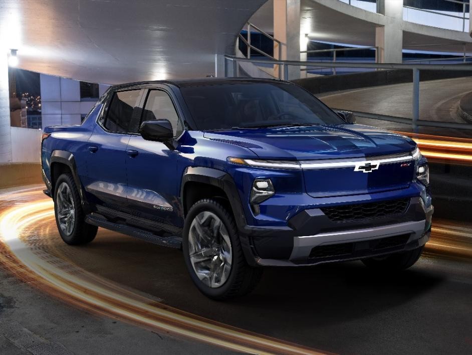 Blue Silverado EV driving