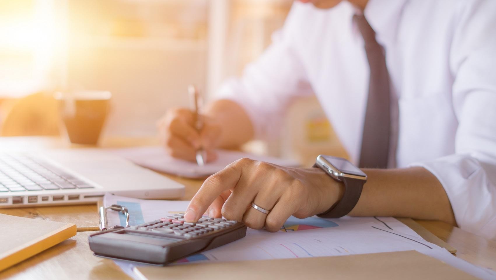 Calculating an auto loan at the Scott Cadillac Finance Center.