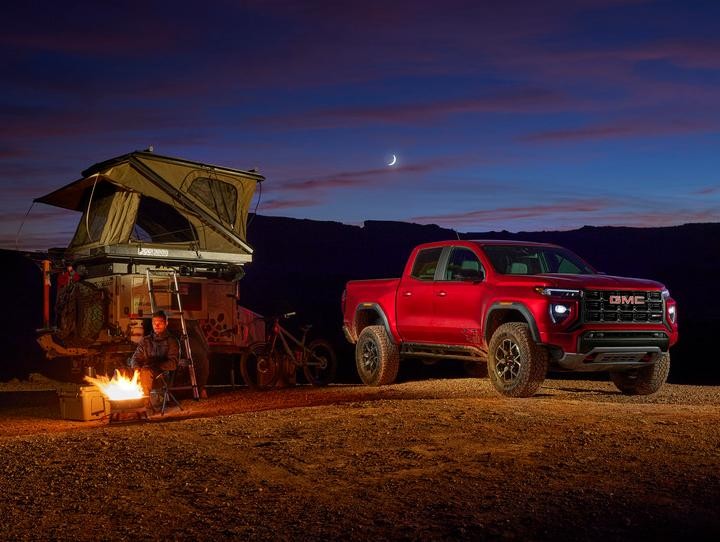 2023 GMC Canyon AT4X at night next to camper