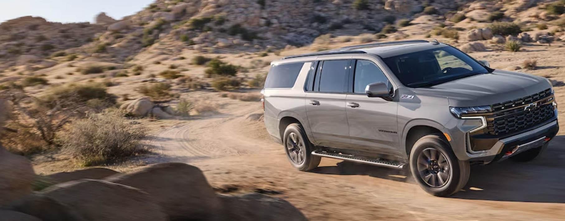 2023 Chevrolet Suburban in deserted area.